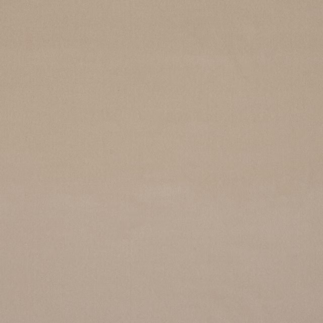 Plain soft mastic beige fabric with a smooth matte surface