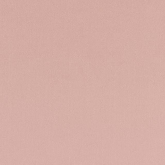 Plain dusty rose fabric swatch with a smooth, matte finish