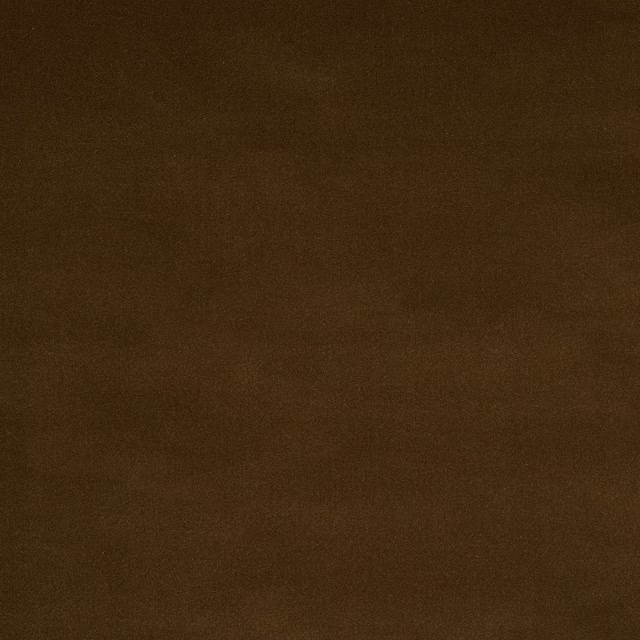 Close-up of deep cocoa-brown plain woven fabric with a soft matte texture