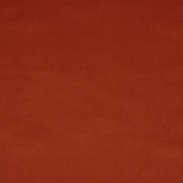 Burnt terracotta plain woven fabric with a soft matte texture