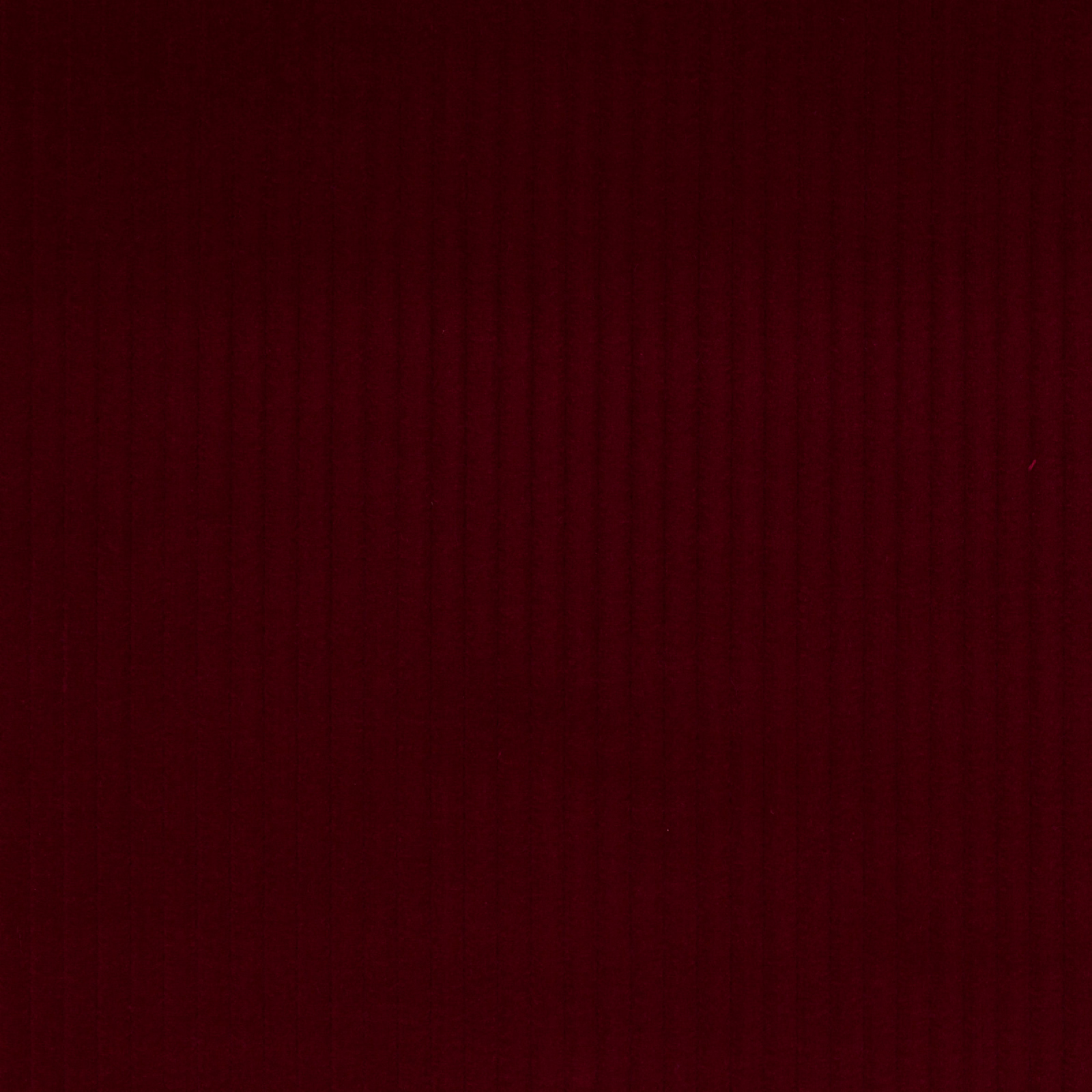 Deep cardinal red cotton fabric with fine vertical ribbed texture