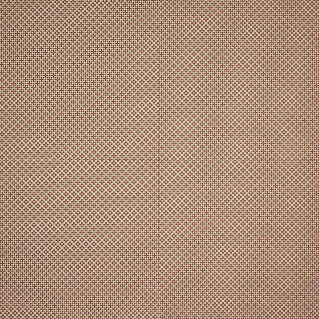 Close-up of small red dot pattern on a pale slate ground, tightly repeated