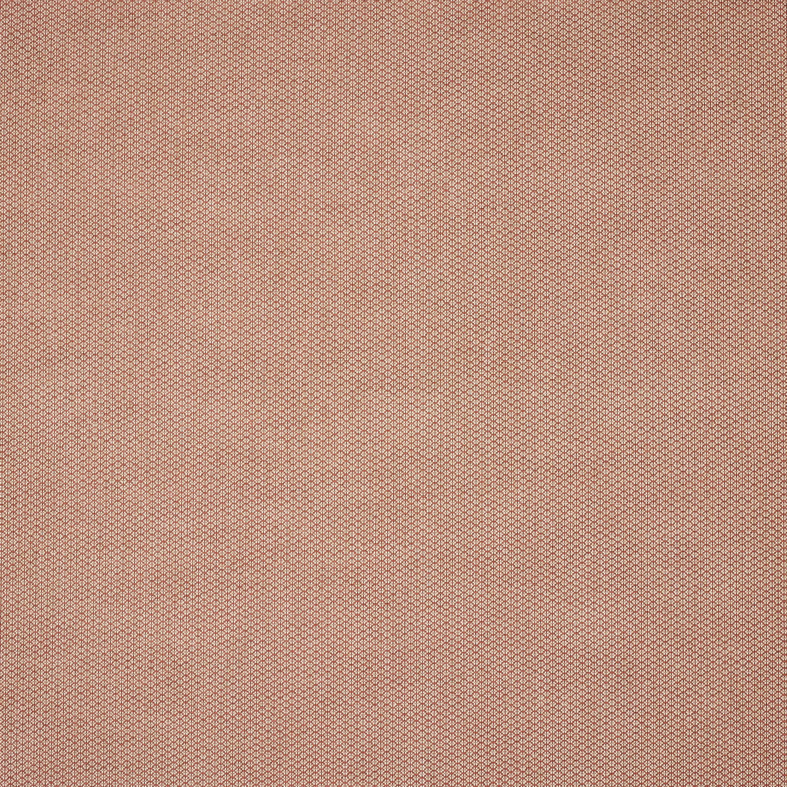 Close-up of dusty brick red woven fabric with tiny textured pattern