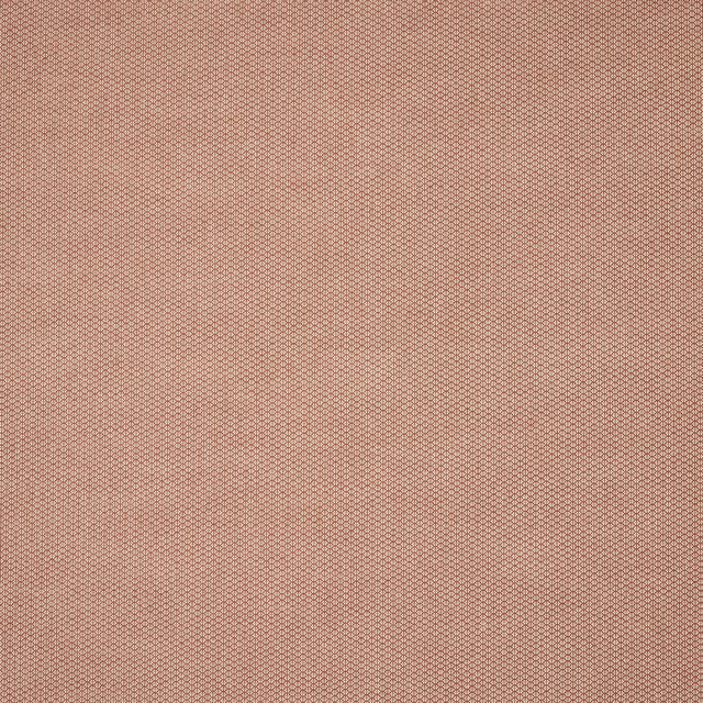 Close-up of dusty brick red woven fabric with tiny textured pattern