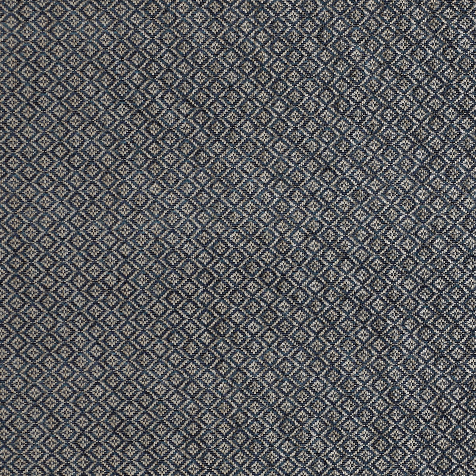 Close-up of small blue and cream diamond geometric woven fabric