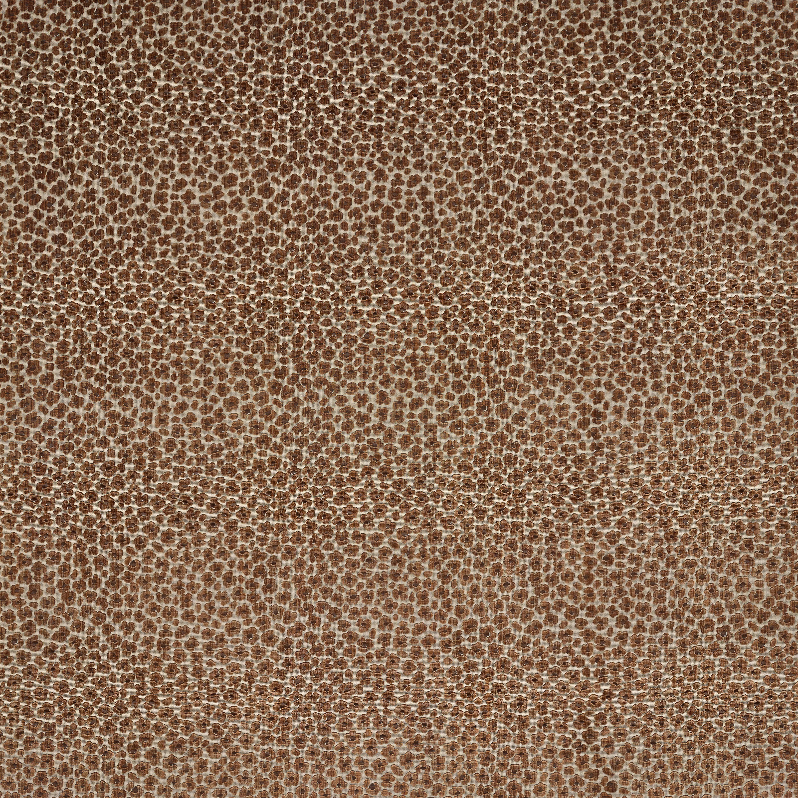 Close-up of beige fabric with dense small sienna-brown spotted pattern