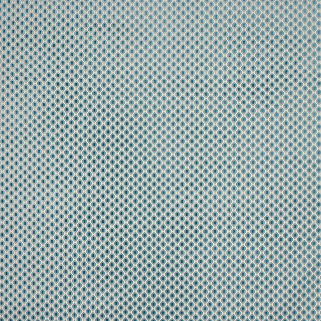 Small blue-teal geometric cotton fabric with tiny diamond motifs on a pale ground
