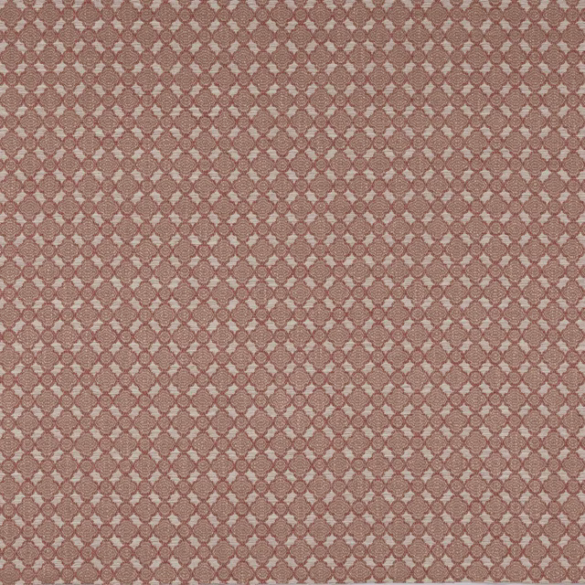 Close-up of Castele Brick geometric fabric in dusty brick rose and cream
