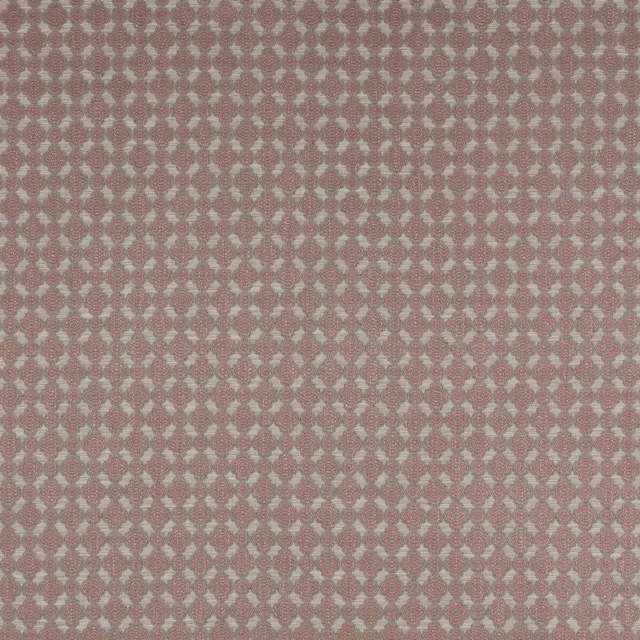 Close-up of dusty rose geometric woven fabric with pale accents