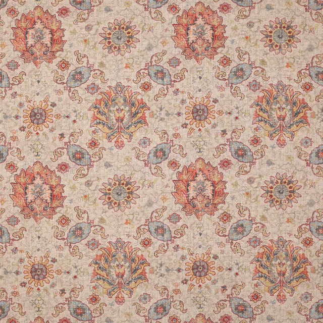 Large-scale floral and paisley fabric in muted red, blue and sand tones