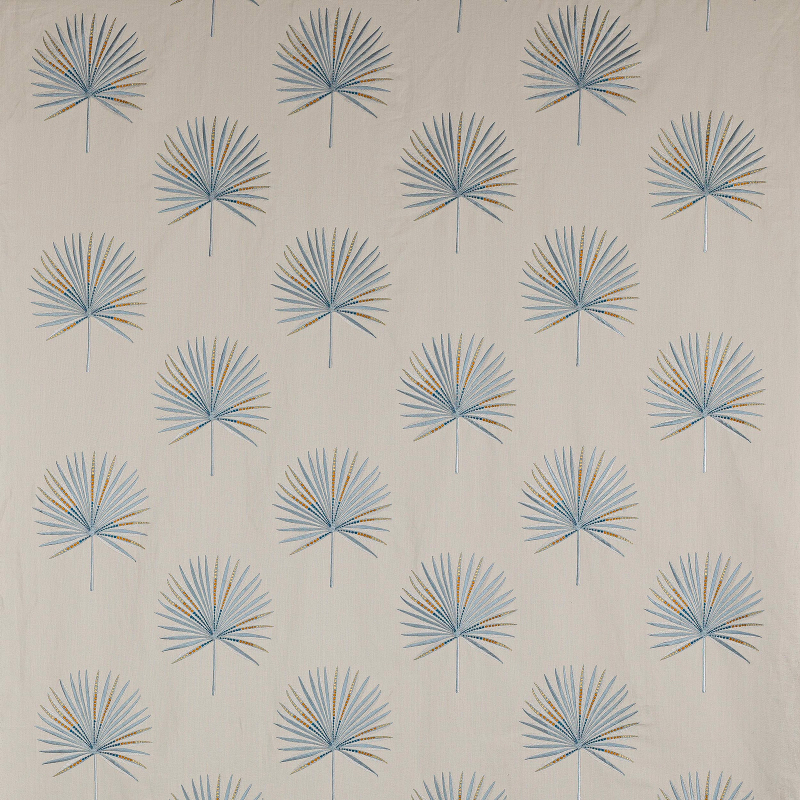 Repeated powder-blue palm motifs with tan accents on a pale ground