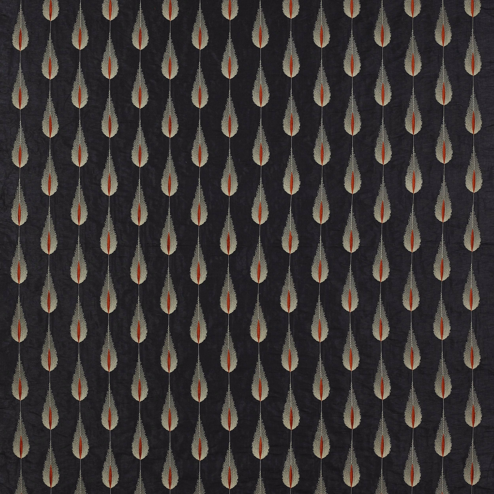 Charcoal fabric with small repeated leaf motifs in pale stone and rust