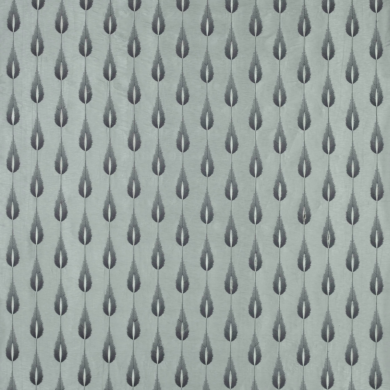 Silver-grey patterned fabric with small vertical teardrop motifs on a pale ground