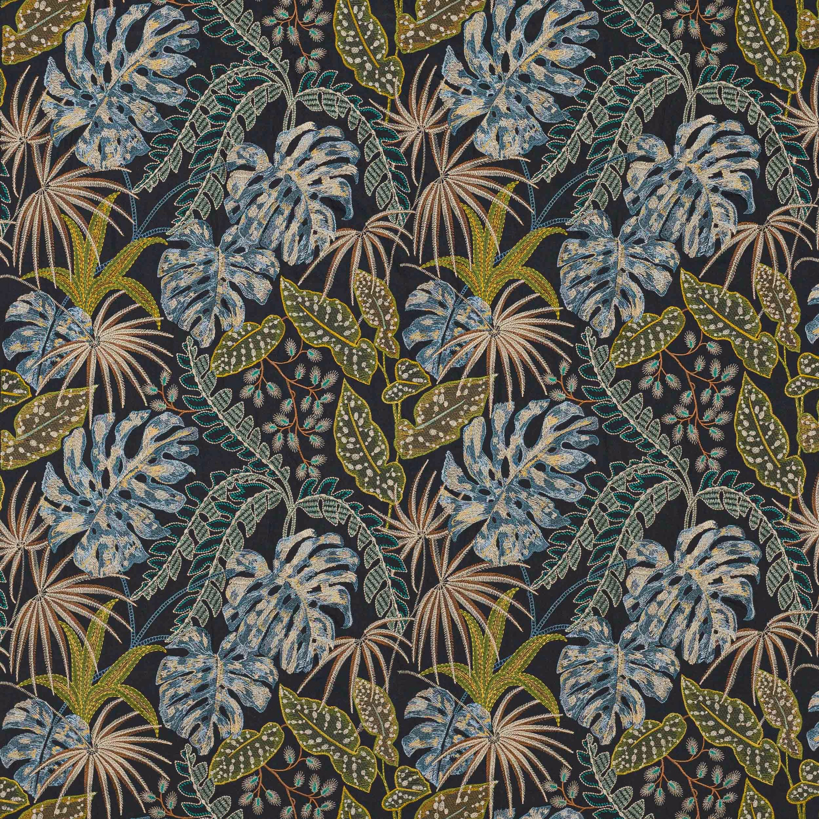 Tropical botanical fabric swatch with indigo ground, blue leaves and green foliage