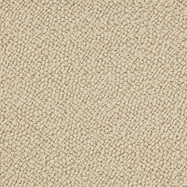Close-up of warm clay beige boucle-style upholstery fabric with tiny textured loops