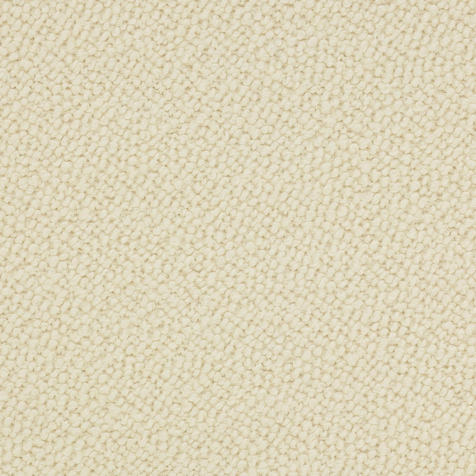 Close-up of soft cream nubby woven upholstery fabric with a boucle-like texture