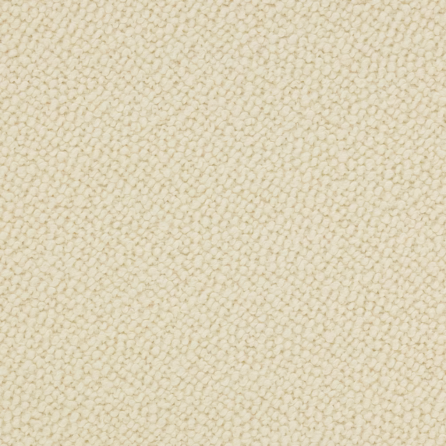 Close-up of soft cream nubby woven upholstery fabric with a boucle-like texture
