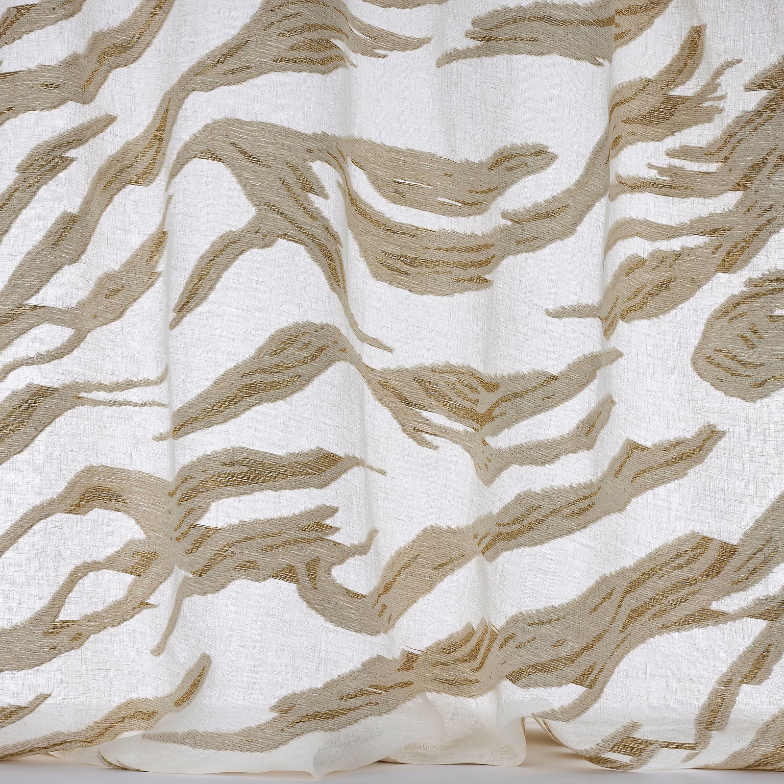 Abstract gold woven motif on a pale ivory linen-blend fabric