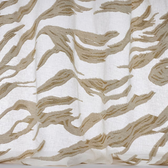 Abstract gold woven motif on a pale ivory linen-blend fabric