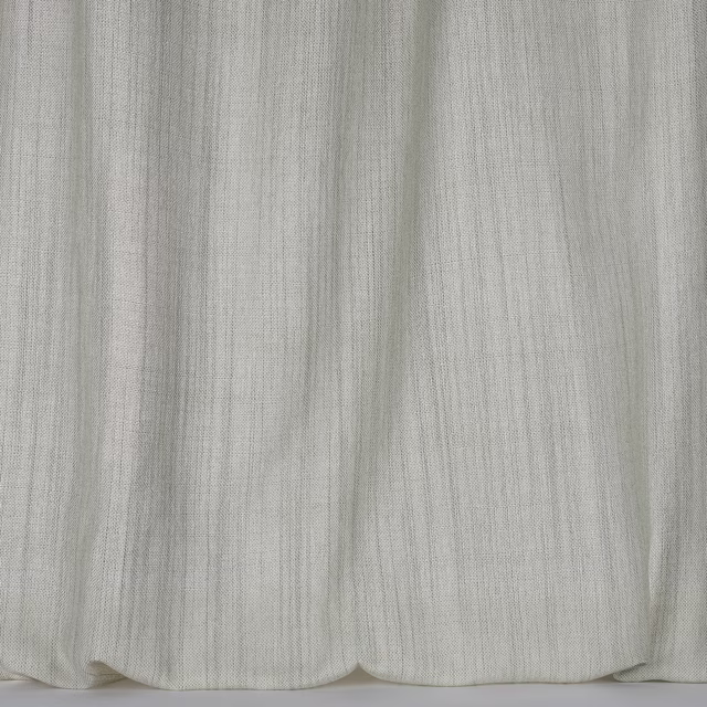 Pale stone-grey fabric with a fine linen-like weave and soft vertical texture