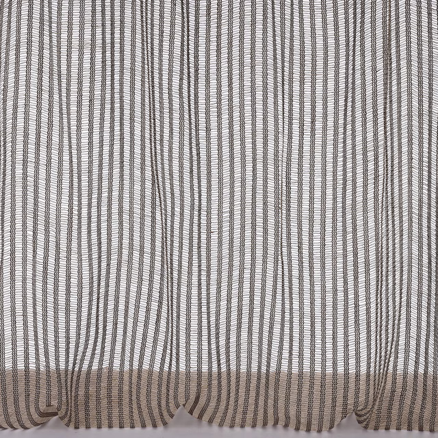 Close-up of warm sand beige linen with fine vertical charcoal stripes