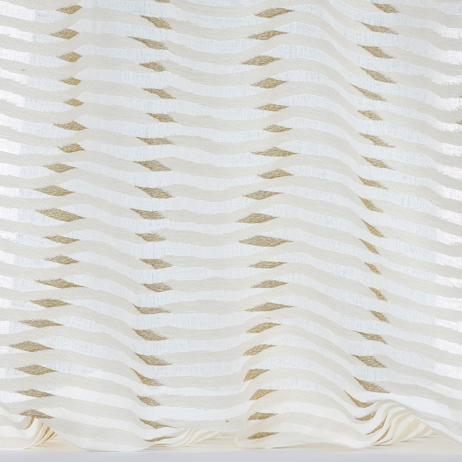 White and ivory striped fabric with small champagne-gold motifs in a flowing wave pattern