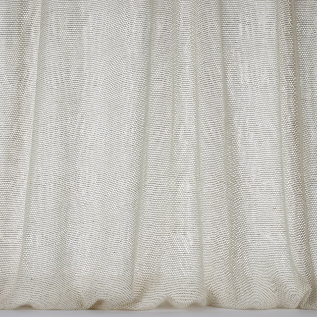 Soft warm beige woven fabric with fine textured folds