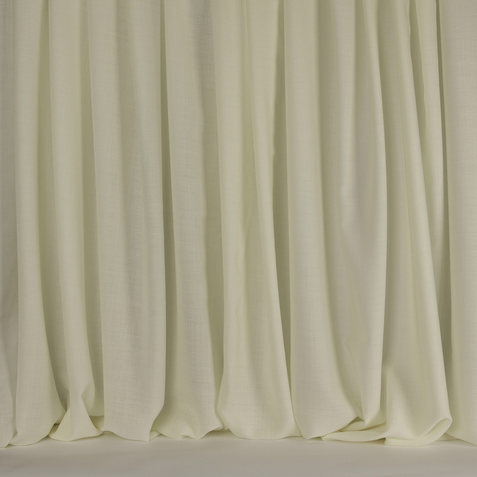 Soft snowy cream wool fabric with a plain, gently textured drape