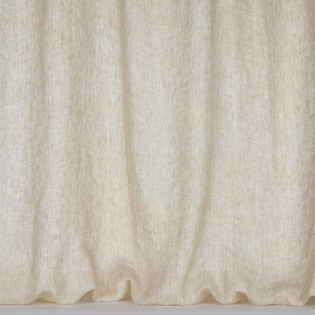 Pale pearl cream linen curtain fabric with soft slubbed texture and gentle folds