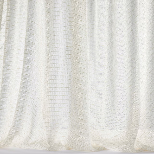 Pale ivory woven fabric with fine horizontal striation and soft drape