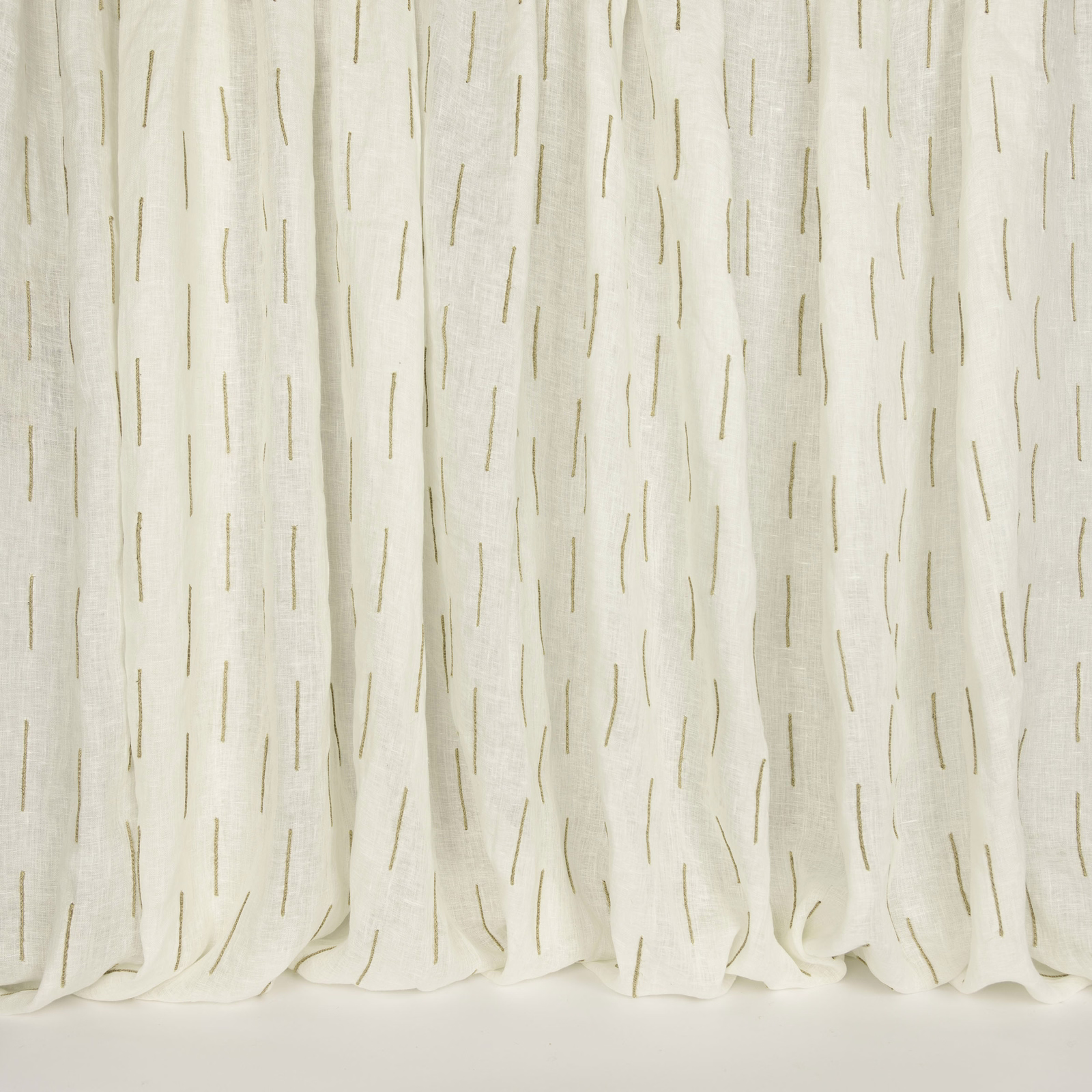 Cream linen-blend fabric with fine warm gold vertical dash stripes