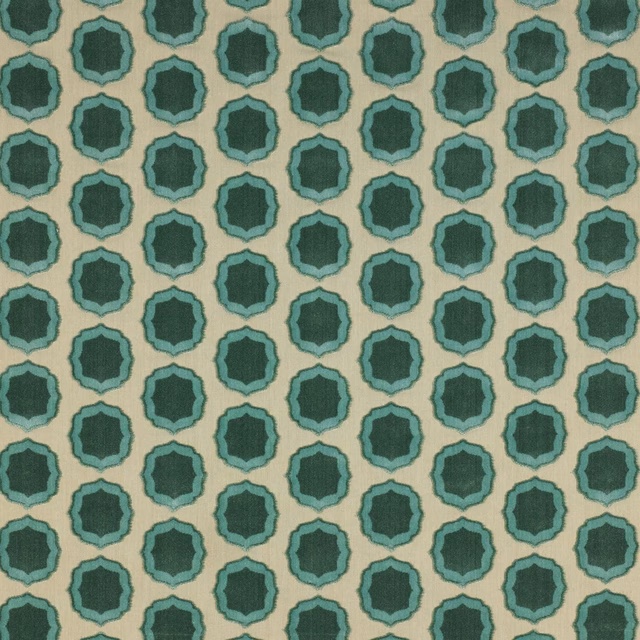 Turquoise and teal small geometric medallions on a pale ground fabric swatch