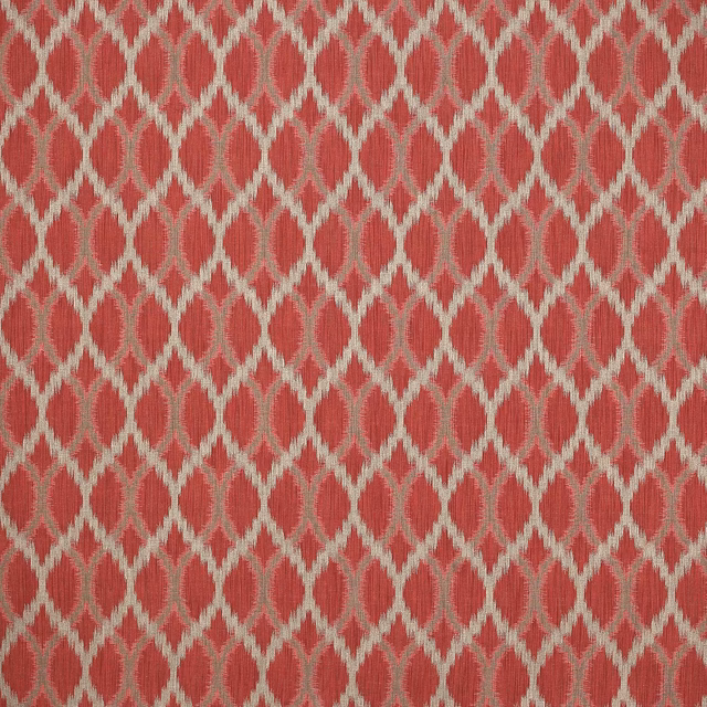 Coral red lattice weave with pale diamond links on textured fabric