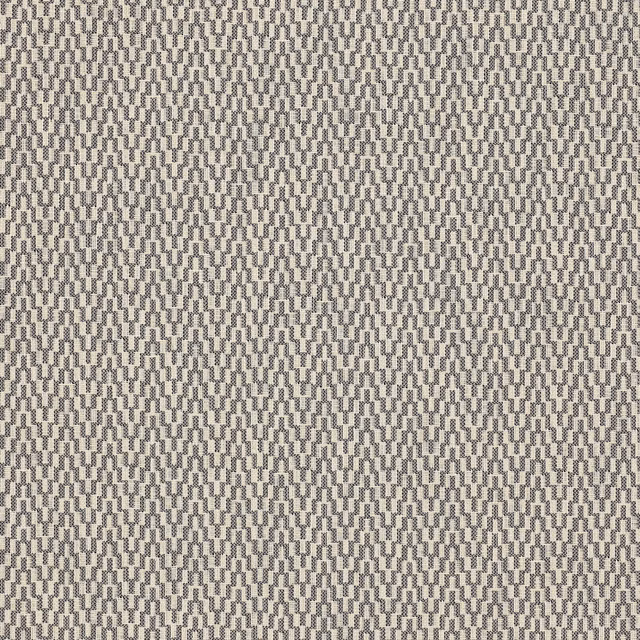 Close-up of small geometric woven fabric in charcoal and pale stone grey