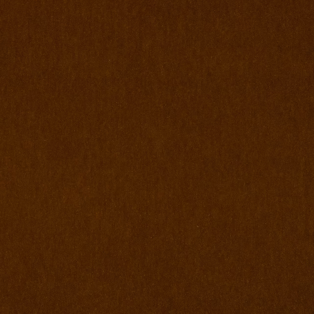 Close-up of deep tobacco brown mohair fabric with a soft velvety pile