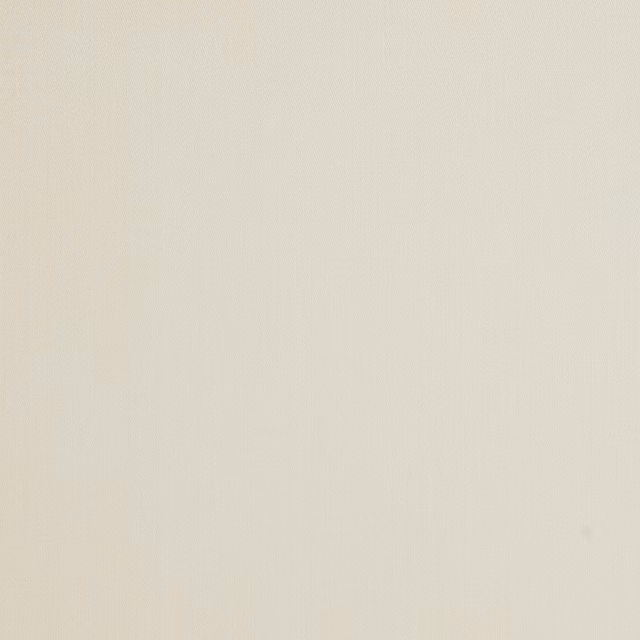 Close-up of a plain soft sable cream fabric with a fine matte texture