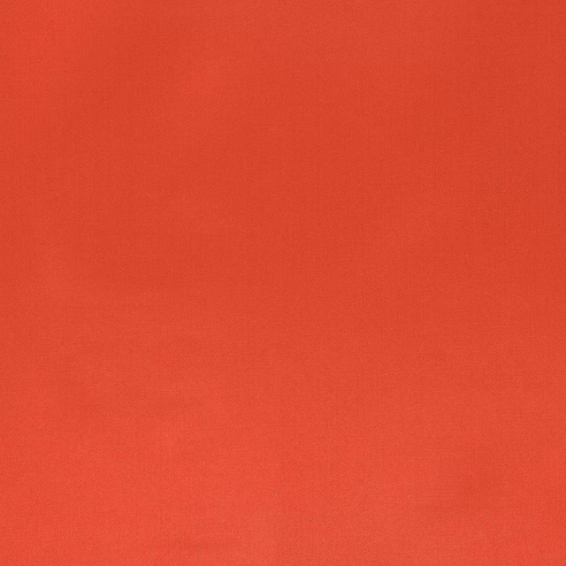 Plain vivid coral-orange fabric with a smooth, softly lustrous finish