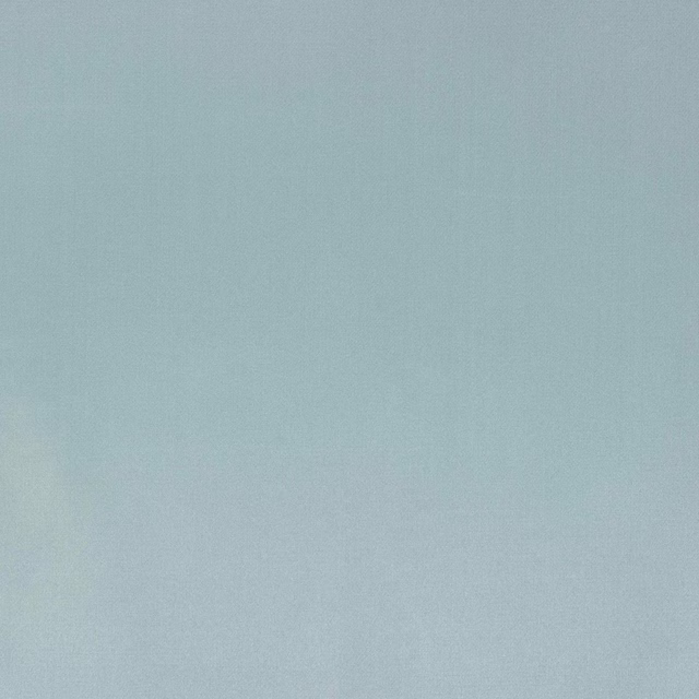 Plain soft aqua-blue fabric with a smooth, lightly lustrous finish