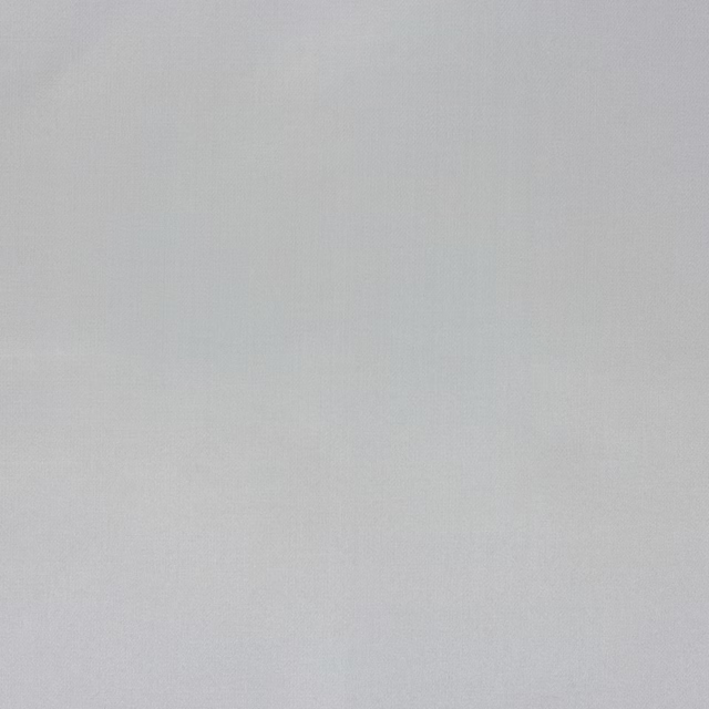 Pale fog-grey plain woven fabric with a soft matte-sheen surface