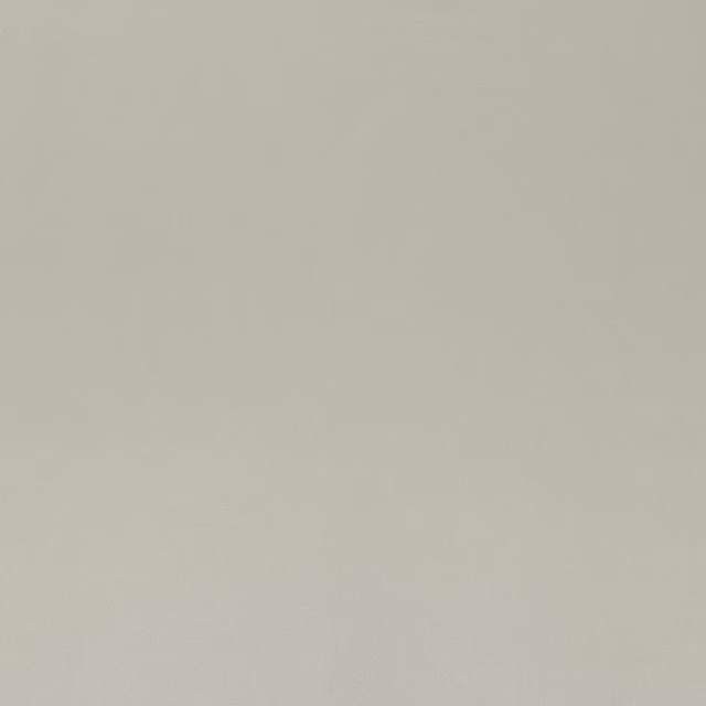 Plain soft warm grey fabric with a smooth, lightly lustrous surface
