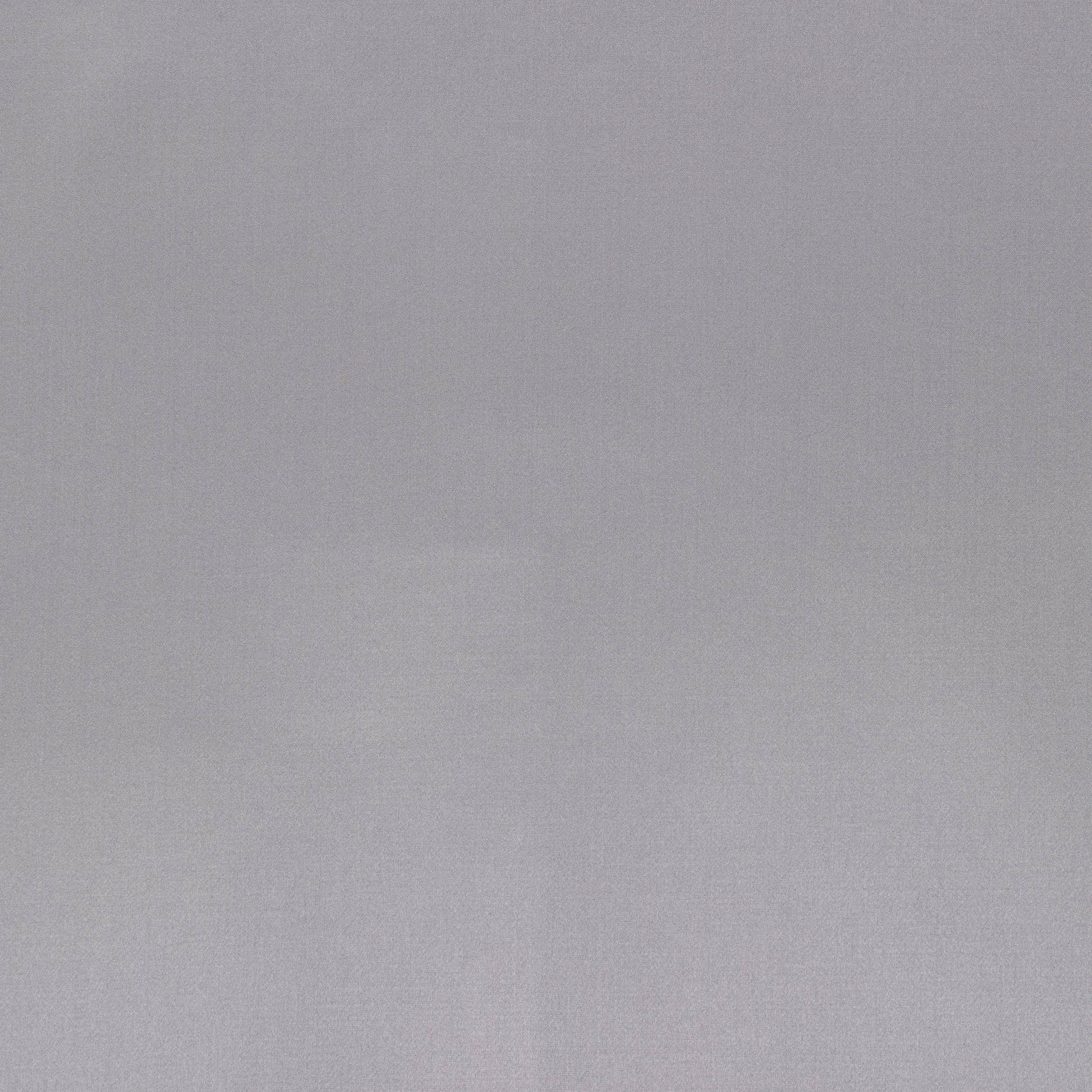 Close-up of smooth cool gunmetal grey fabric with a subtle silky sheen