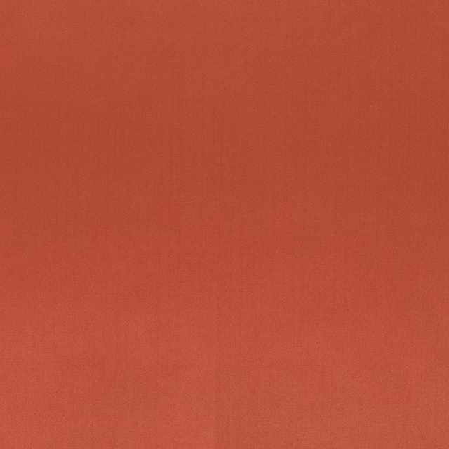 Plain rosewood terracotta fabric with a smooth, subtly lustrous surface
