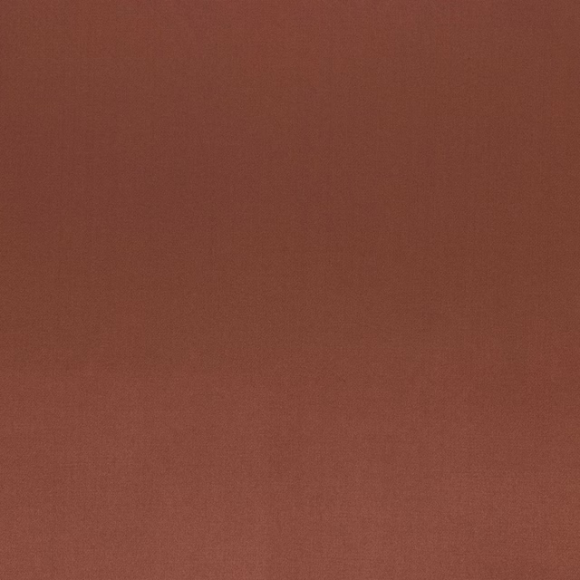 Plain burnt terracotta-brown fabric swatch with a soft matte-lustre finish