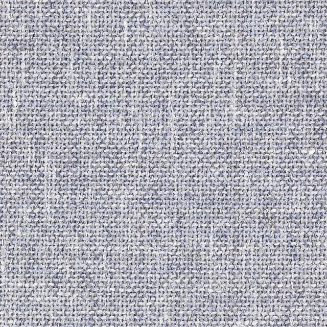 Close-up of a soft lilac-grey woven fabric with a small textured basketweave