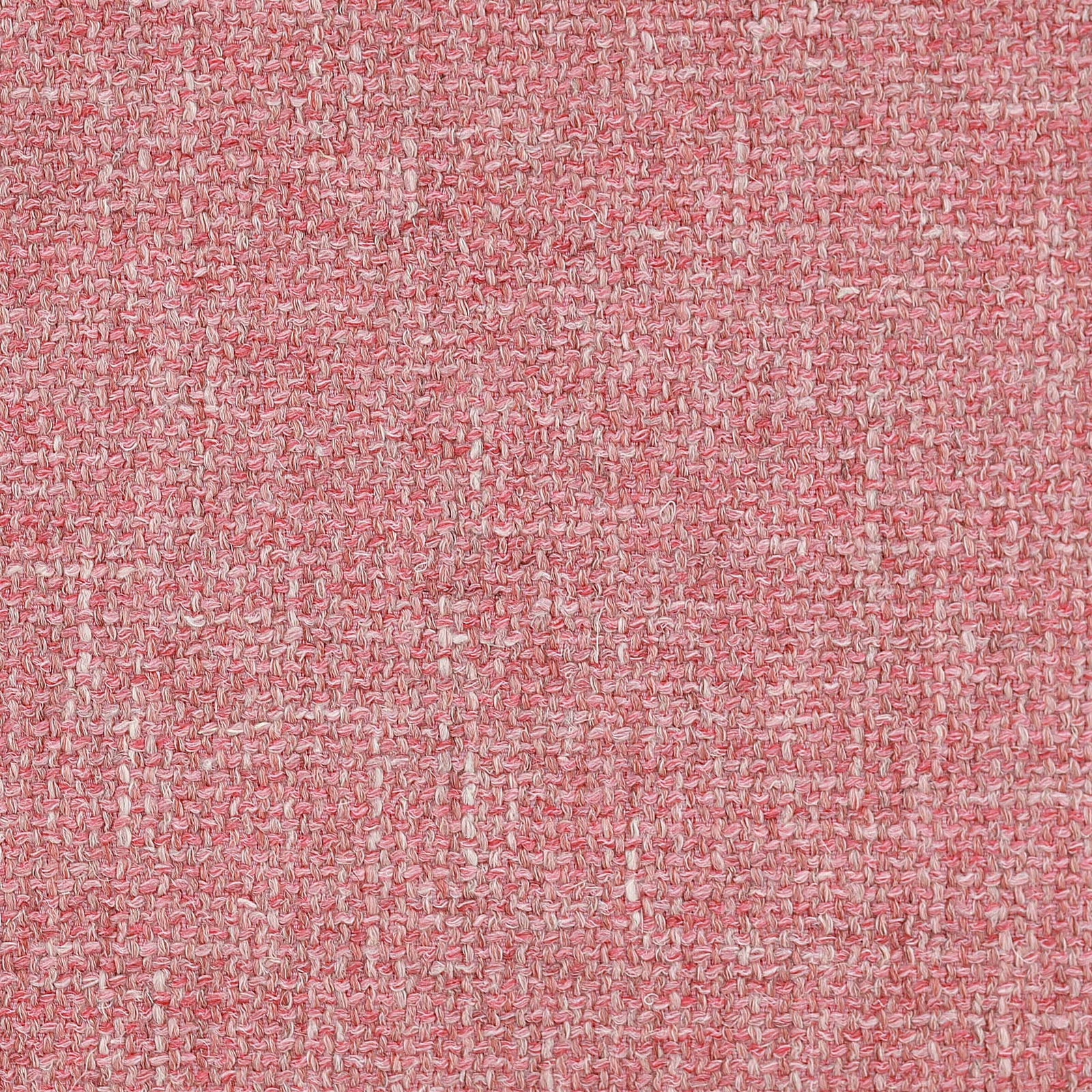 Soft rosy coral woven fabric with a nubby textured surface and creamy flecks