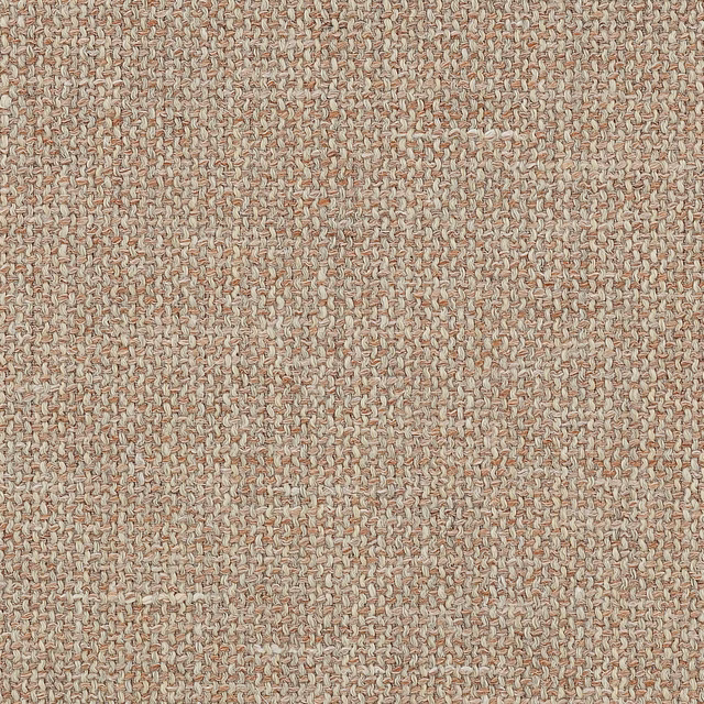 Textured terracotta-beige woven fabric swatch with a slubby plain weave