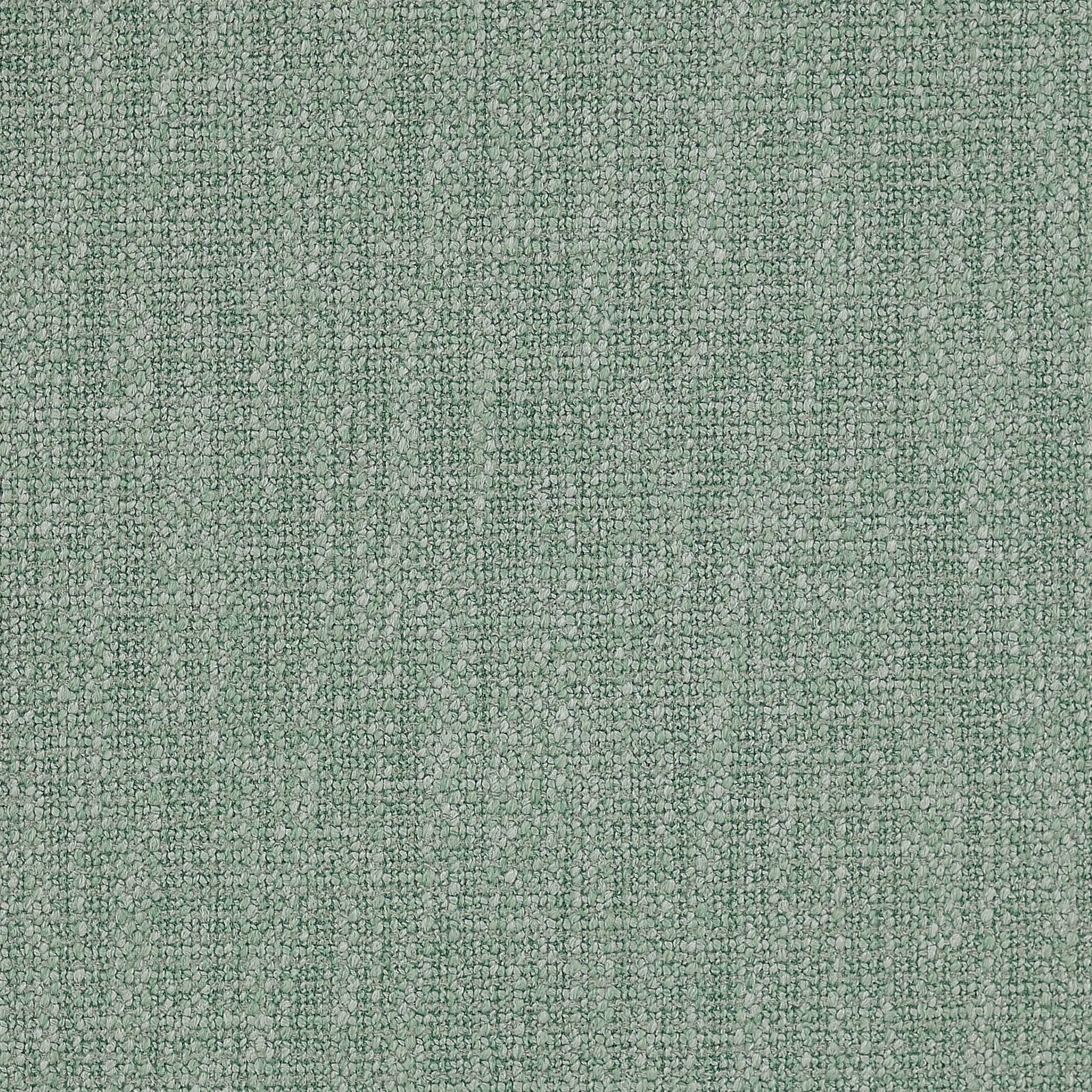 Soft sage green textured plain fabric with a fine mottled weave