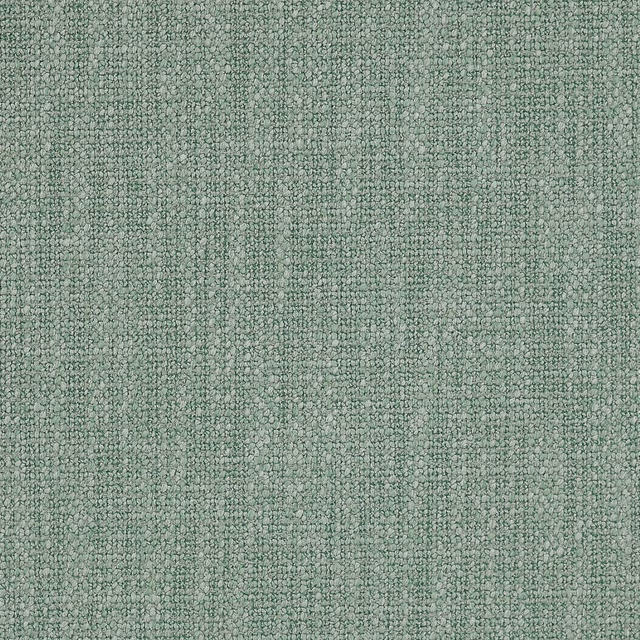Soft sage green textured plain fabric with a fine mottled weave