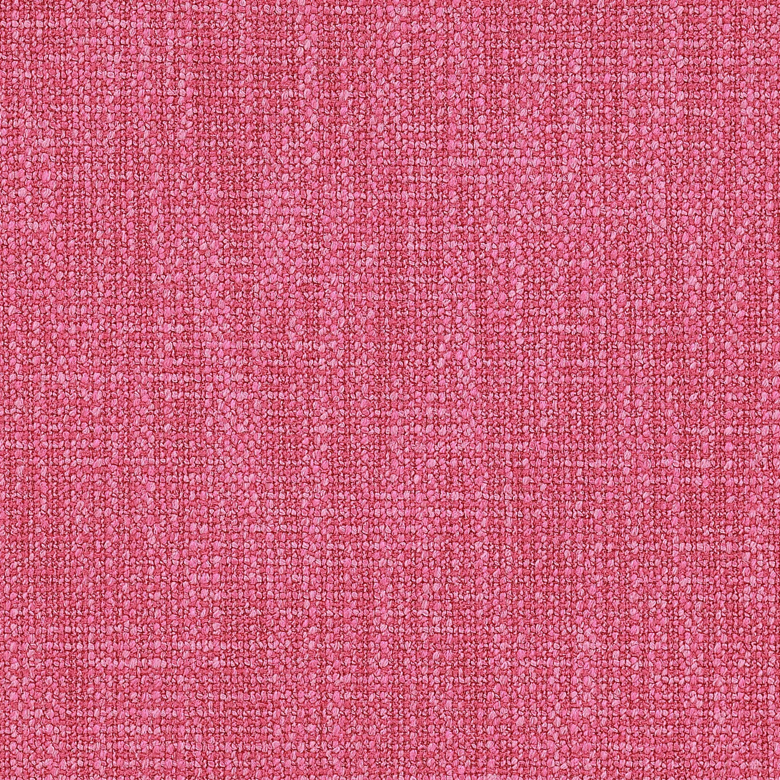 Close-up of a bright raspberry pink textured woven fabric with a pebbled surface