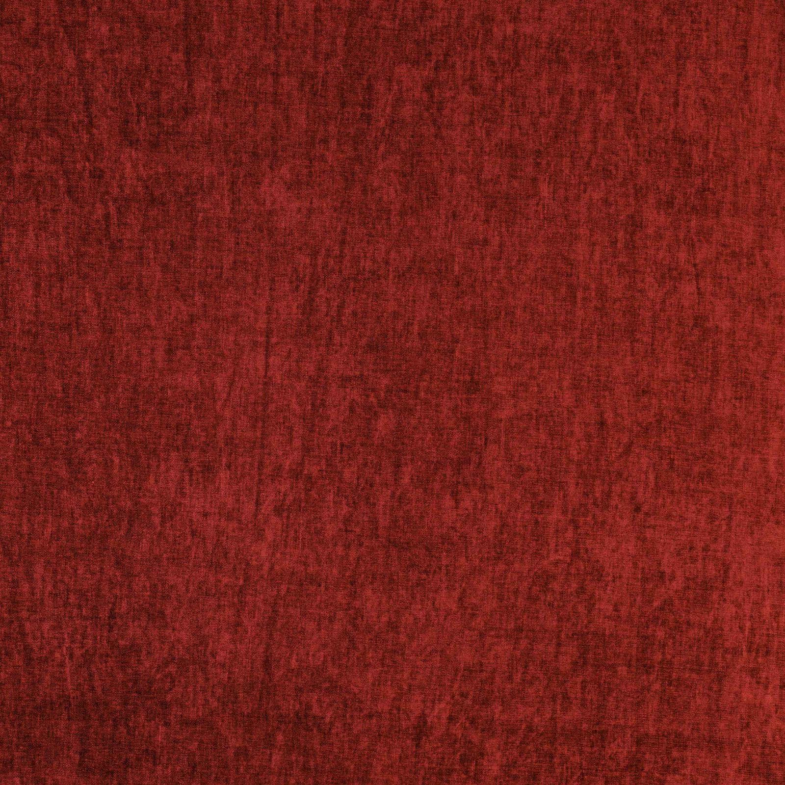 Deep russet red textured fabric swatch with a soft mottled weave